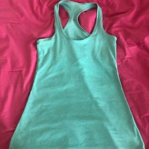 Aqua lululemon tank top.